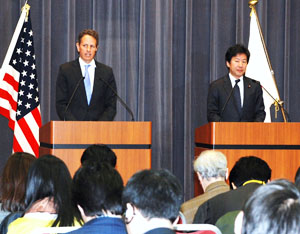Treasury Secretary Geithner and Finance Minister Azumi address the media in   Tokyo.